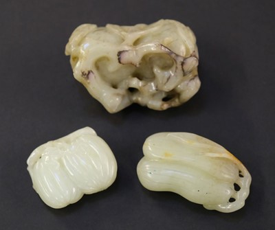 Lot 100 - Jade. Three Chinese carved jade fruit