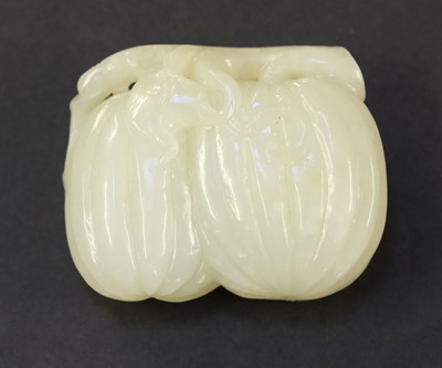 Lot 100 - Jade. Three Chinese carved jade fruit