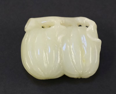 Lot 100 - Jade. Three Chinese carved jade fruit