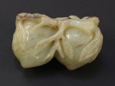 Lot 100 - Jade. Three Chinese carved jade fruit