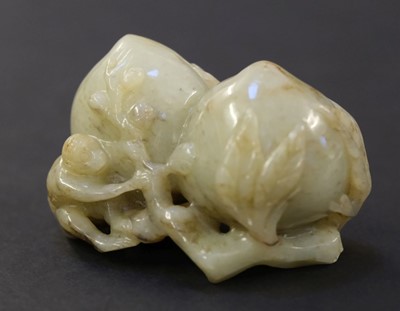 Lot 100 - Jade. Three Chinese carved jade fruit