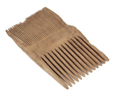 Lot 125 - Egypt. An Egyptian late Roman Coptic period carved wooden hair comb