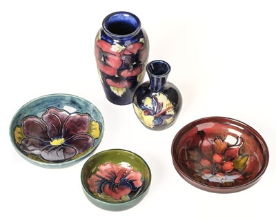 Lot 11 - Moorcroft. A Moorcroft pottery Pansy pattern shoulder vase and other items