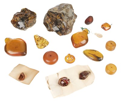Lot 92 - Amber. A collection of amber including a rough amber boulder