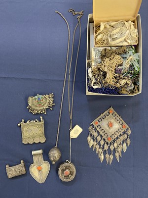 Lot 27 - Tibetan Jewellery. A mixed collection of white metal jewellery