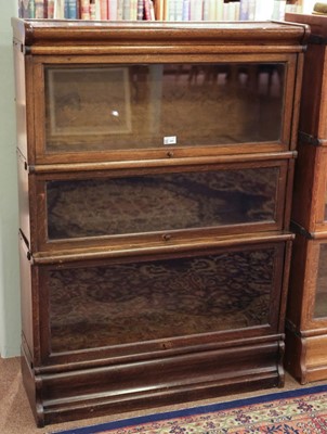 Lot 424 - Bookcase. A 1920s Globe Wernicke style 3-tier bookcase