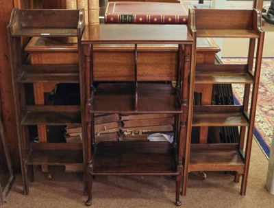 Lot 426 - Bookcase. A pair of 1920s shaped oak bookcases