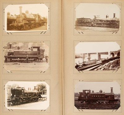 Lot 270 - Railway Postcards. An album containing approximately 450 real photo postcards of railway interest