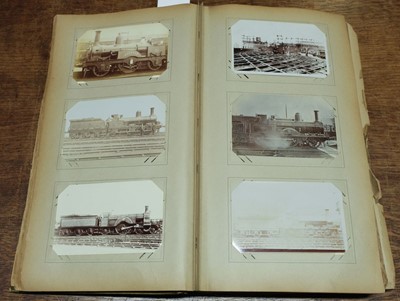 Lot 270 - Railway Postcards. An album containing approximately 450 real photo postcards of railway interest