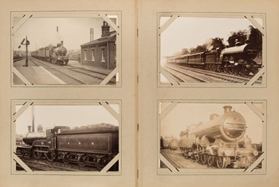 Lot 268 - Railway Postcards. An album containing approximately 185 real photo postcards