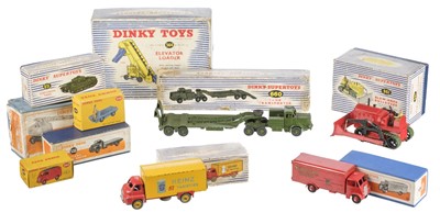 Lot 267 - Dinky Toys. A group of ten post-war die-cast metal toy vehicles, c. 1950s