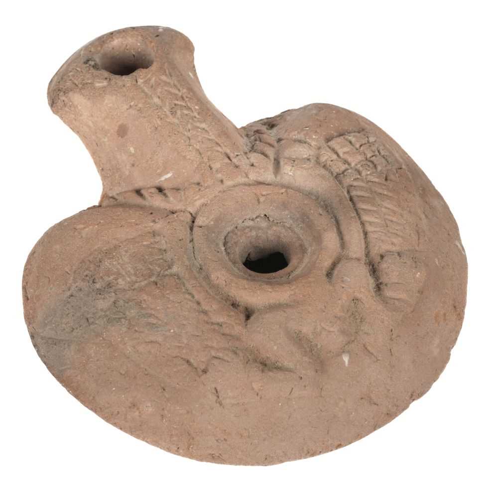 Lot 436 - Egypt. An ancient Egyptian oil lamp, frog type 2nd -4th century