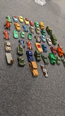Lot 265 - Dinky Toys. A collection of 44 post-war die-cast metal toy vehicles, c. 1950s