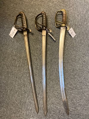 Lot 393 - Swords. A Victorian customs officer's sword plus two cutlasses