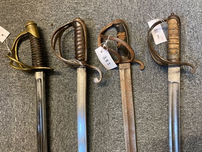 Lot 385 - Swords. A 19th century American cavalry sword and three other swords