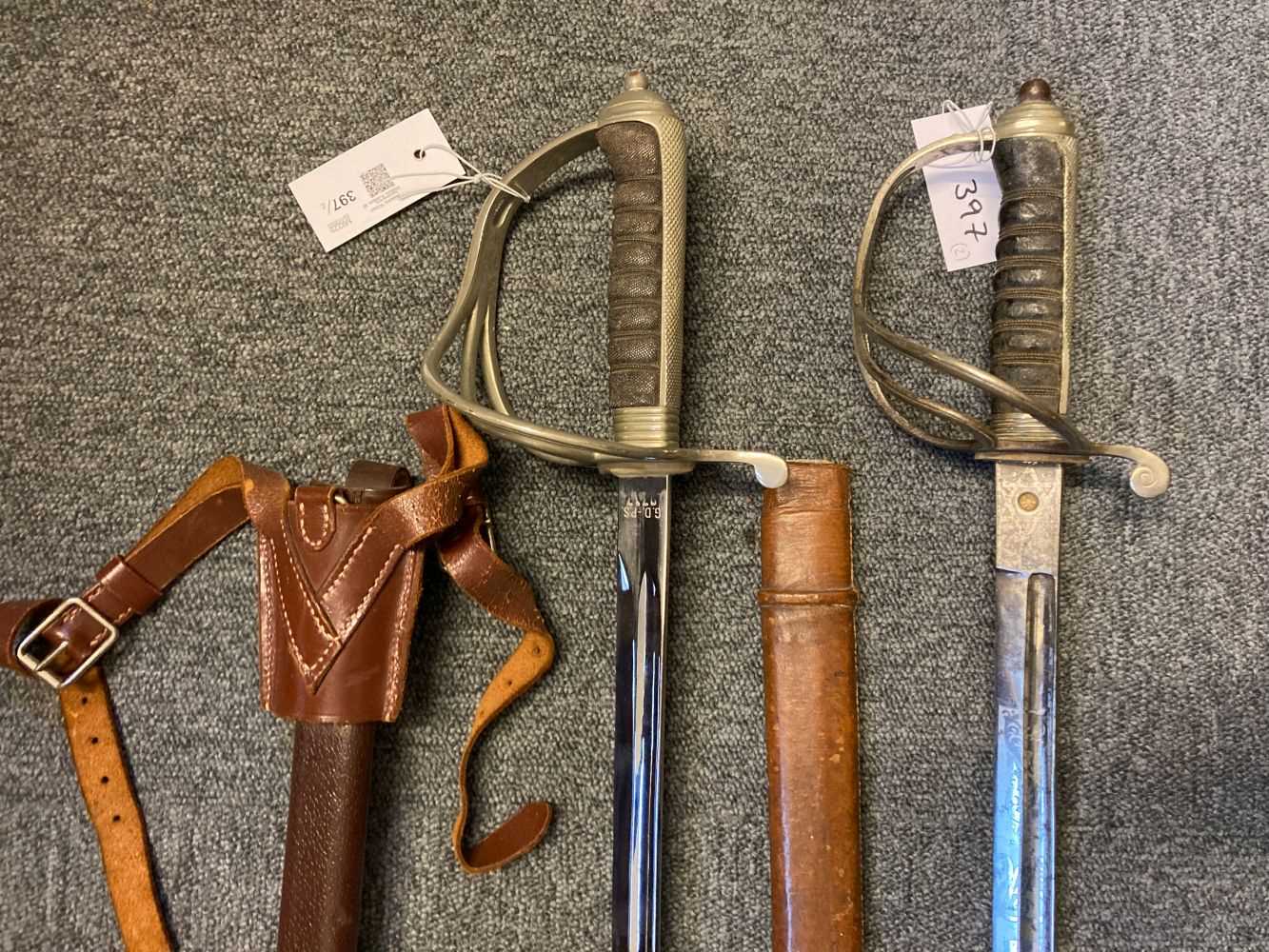 Lot 397 - Swords. A WWI Royal Artillery officer's sword and South African sword