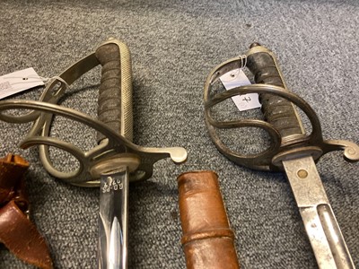 Lot 397 - Swords. A WWI Royal Artillery officer's sword and South African sword