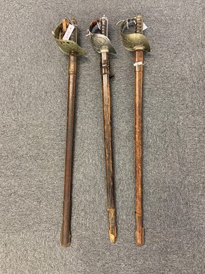 Lot 399 - Swords. Three WWI period 1897 pattern infantry officer's swords