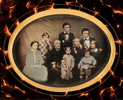 Lot 40 - Daguerreotype. A three-quarter plate hand-tinted daguerreotype of an unidentified family, c. 1855