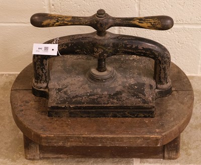 Lot 348 - Book press. A cast iron book press