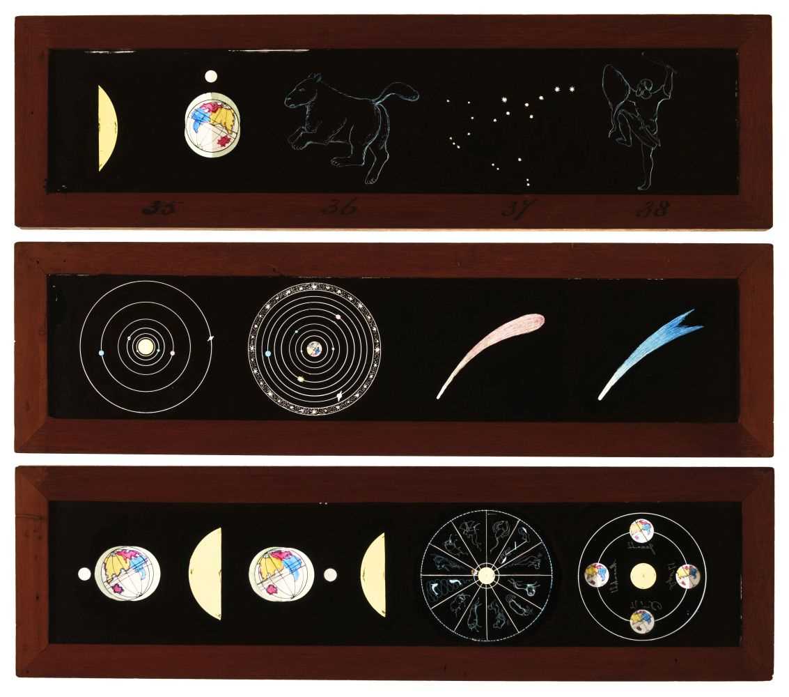 Lot 5 - Astronomical Slides. A set of 12 hand-painted panoramic lantern slides & 1 lever slide of astronomy