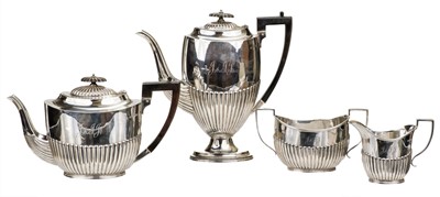 Lot 497 - Tea Service. A Victorian four-piece silver tea service by Joseph Rogers & Sons, Sheffield 1894