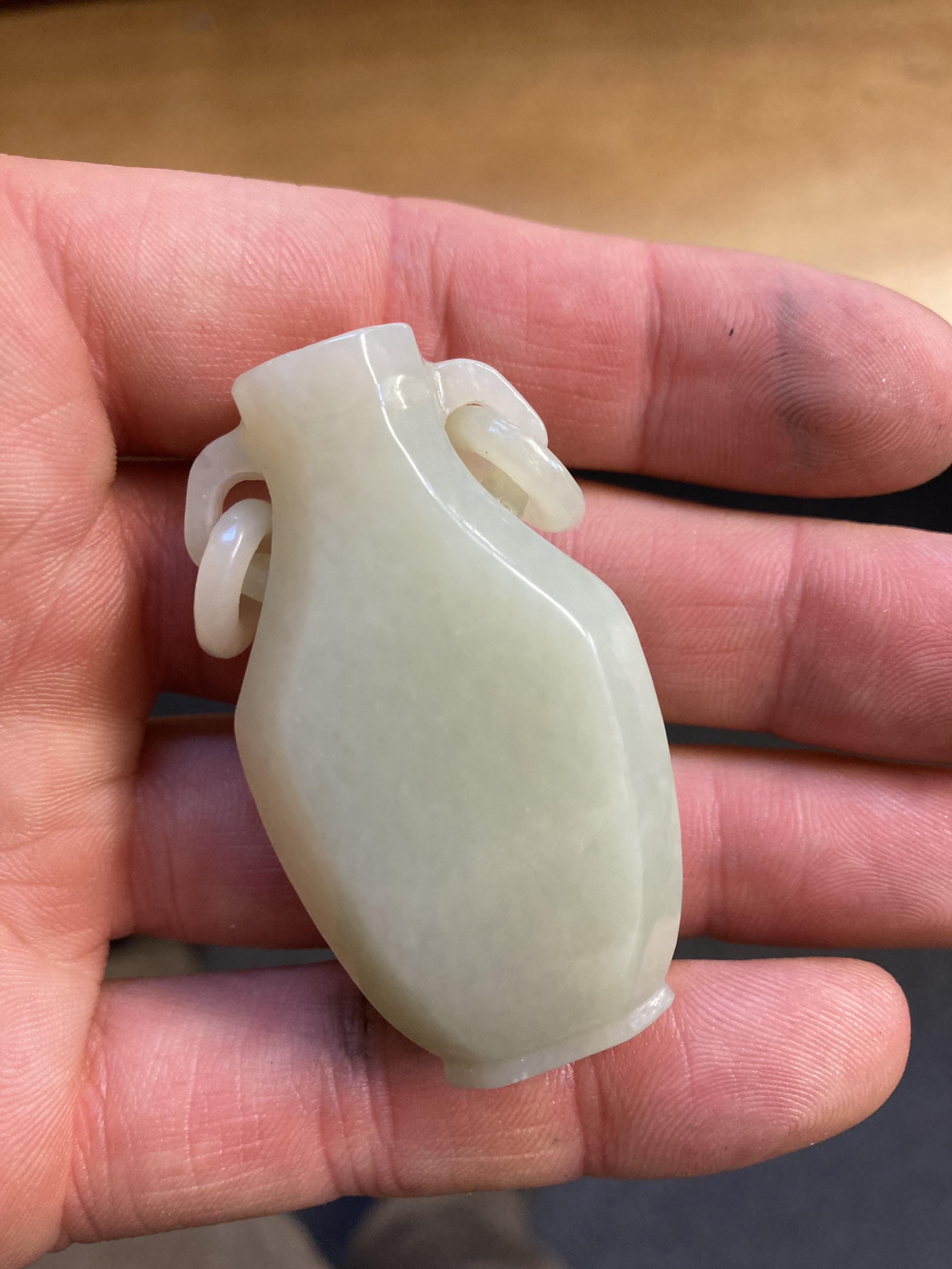 Lot 444 Jade. A Chinese miniature jade vase, archers