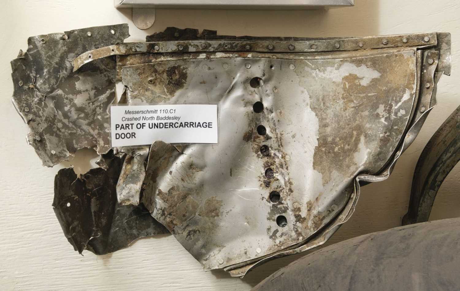 Lot 437 - Messerschmitt Me 110C. Part of the undercarriage door recovered from Messerschmitt Me110C-1