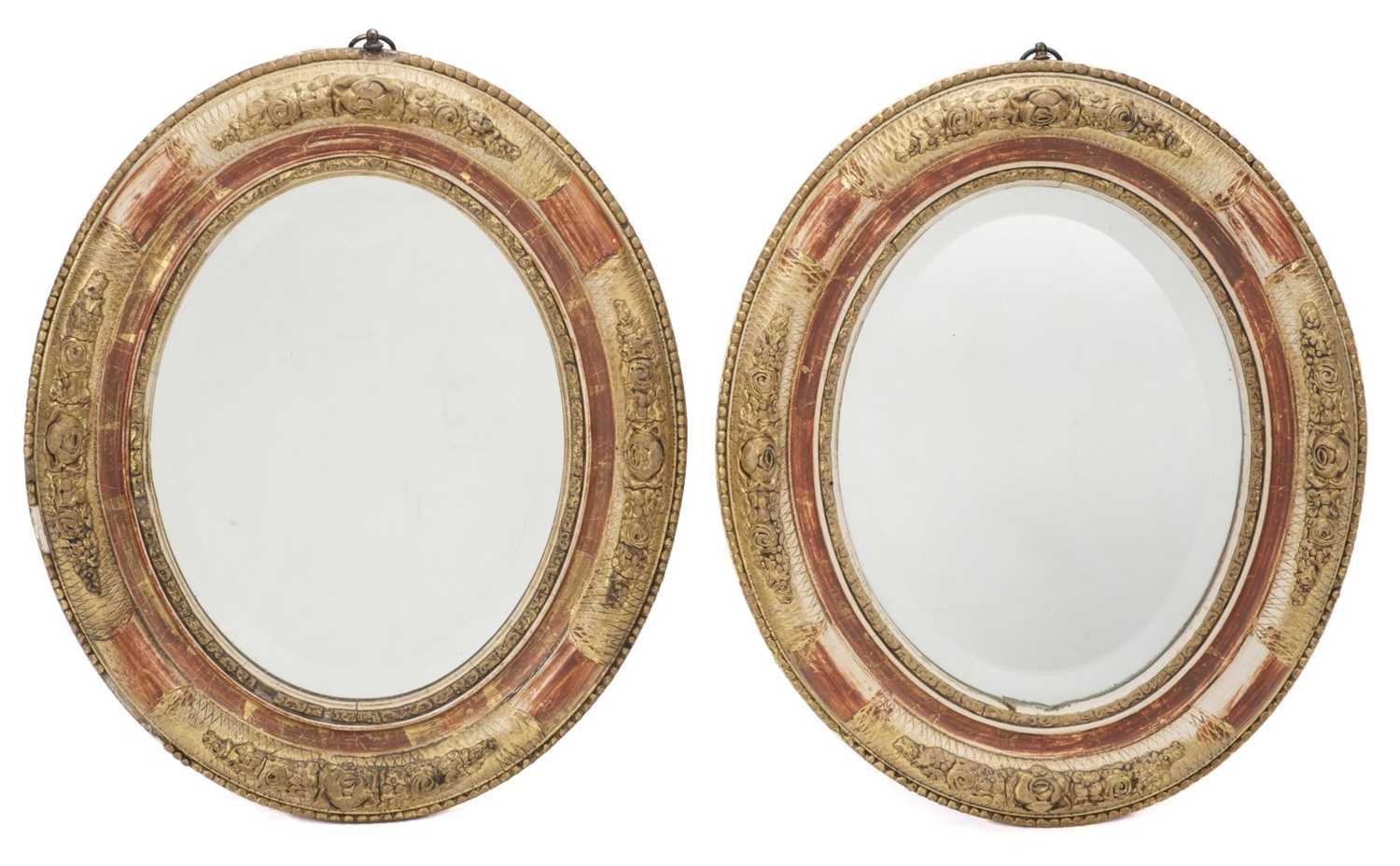 Lot 429 - Mirrors. An attractive pair of late Victorian oval giltwood mirrors