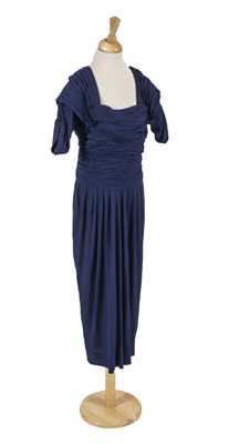 Lot 653 - Worth (House of). A 1930s cocktail dress, & others