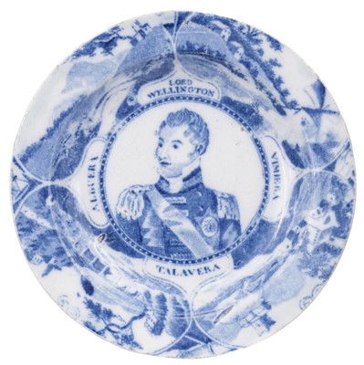 Lot 543 - Duke of Wellington. A George III blue and white pottery dish circa 1811