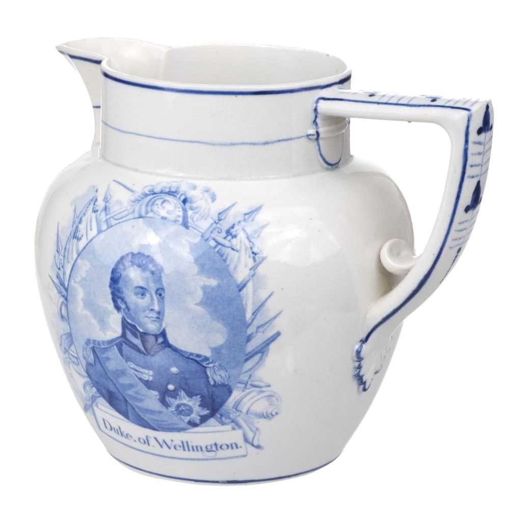 Lot 547 - Duke of Wellington. A George III period pearlware puzzle jug circa 1815