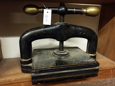 Lot 339 - Book press. A cast iron book press