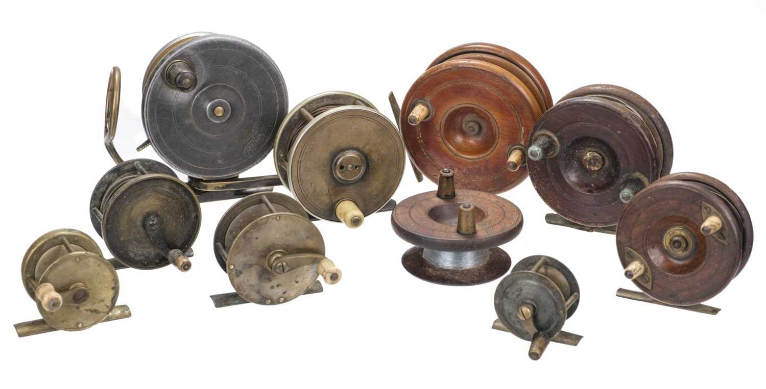 Sold at Auction: EARLY WOOD & BRASS FISHING REEL