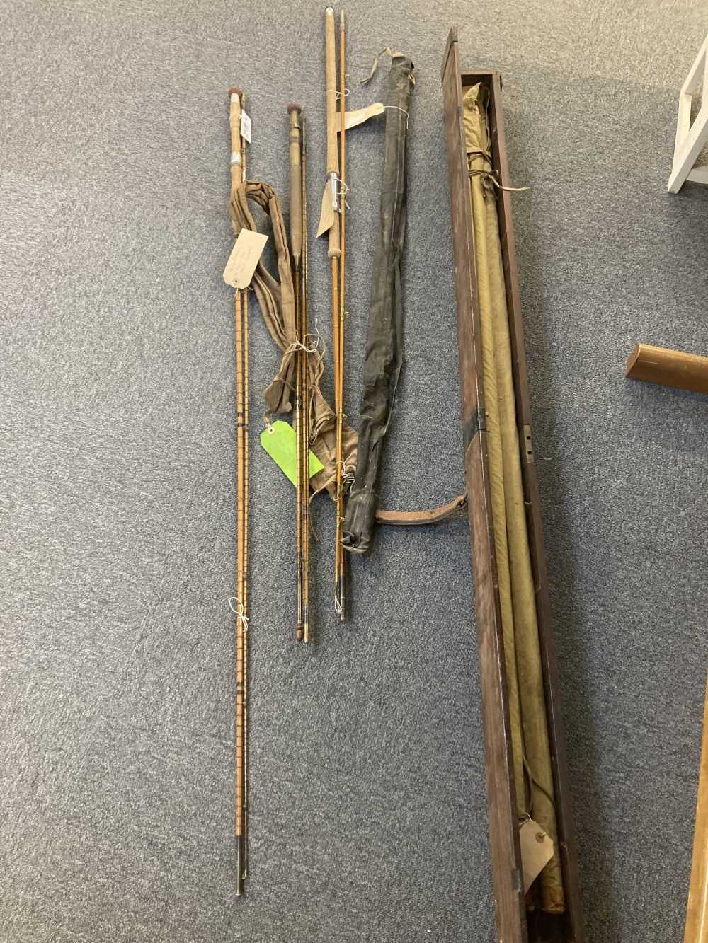 Lot 424 - Fishing Rods. A collection of vintage fishing rods