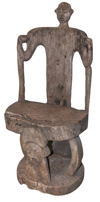 Lot 459 - Tribal Art. An early to mid 20th century African hardwood chair