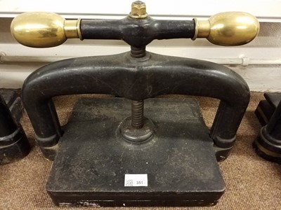 Lot 351 - Book press. A cast iron book press