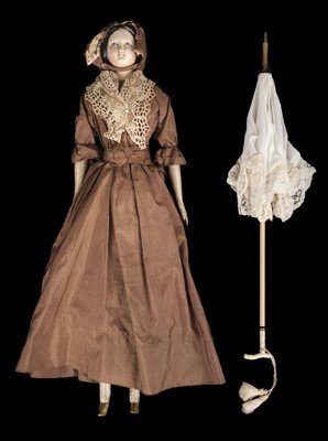 Lot 510 - Doll. A large wooden doll with parasol, circa 1840