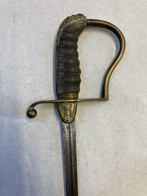 Lot 127 - Swords. A George V period naval officer's sword plus child's sword