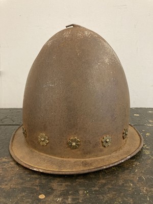 Lot 33 - Armour. A copy of a 16th century cabaset steel helmet