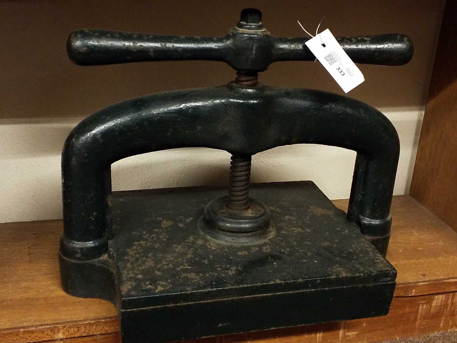 Lot 333 - Book press. A cast iron book press