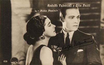 Lot 275 - Valentino (Rudolph, 1895-1926). Vintage signed real photo Italian postcard of Valentino & Nita Naldi