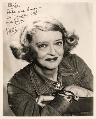 Lot 210 - Davis (Bette, 1908-1989). A signed and inscribed glossy photograph