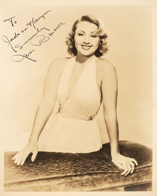 Lot 198 - Blondell (Joan, 1906-1979). A vintage signed and inscribed sepia photograph