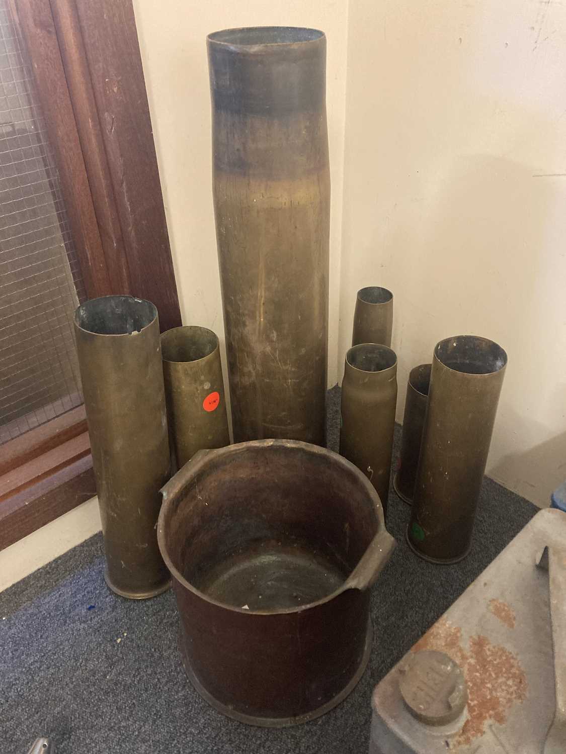 Lot 52 - Munitions. WWI German Howitzer cartridge case and other brass shell cases