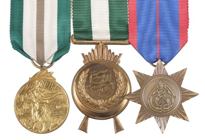 Lot 184 - Iraq. A group of three Iraqi medals including Flood Rescue Medal 1954