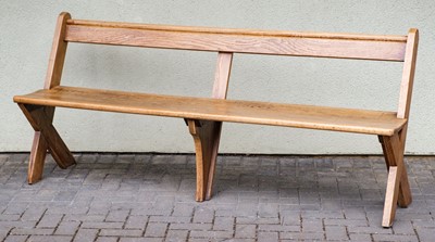 Lot 600 - Refectory Table. A modern pine refectory table and oak benches