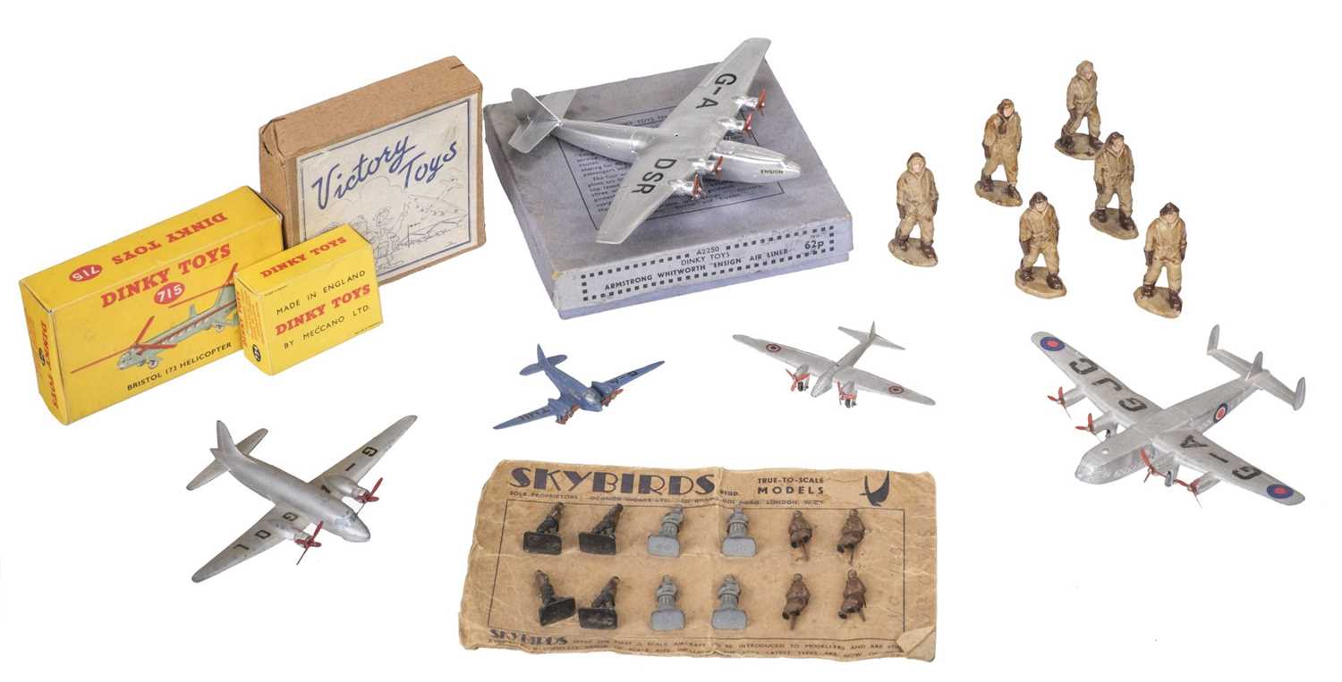 Lot 281 - Aviation Toys. A collection of 12 Skybirds miniature airmen, Dinky Toys and other items