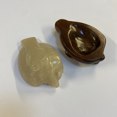 Lot 485 - Jade. A Chinese jade pebble, carved as a bird plus a chilong