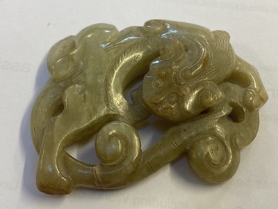 Lot 485 - Jade. A Chinese jade pebble, carved as a bird plus a chilong